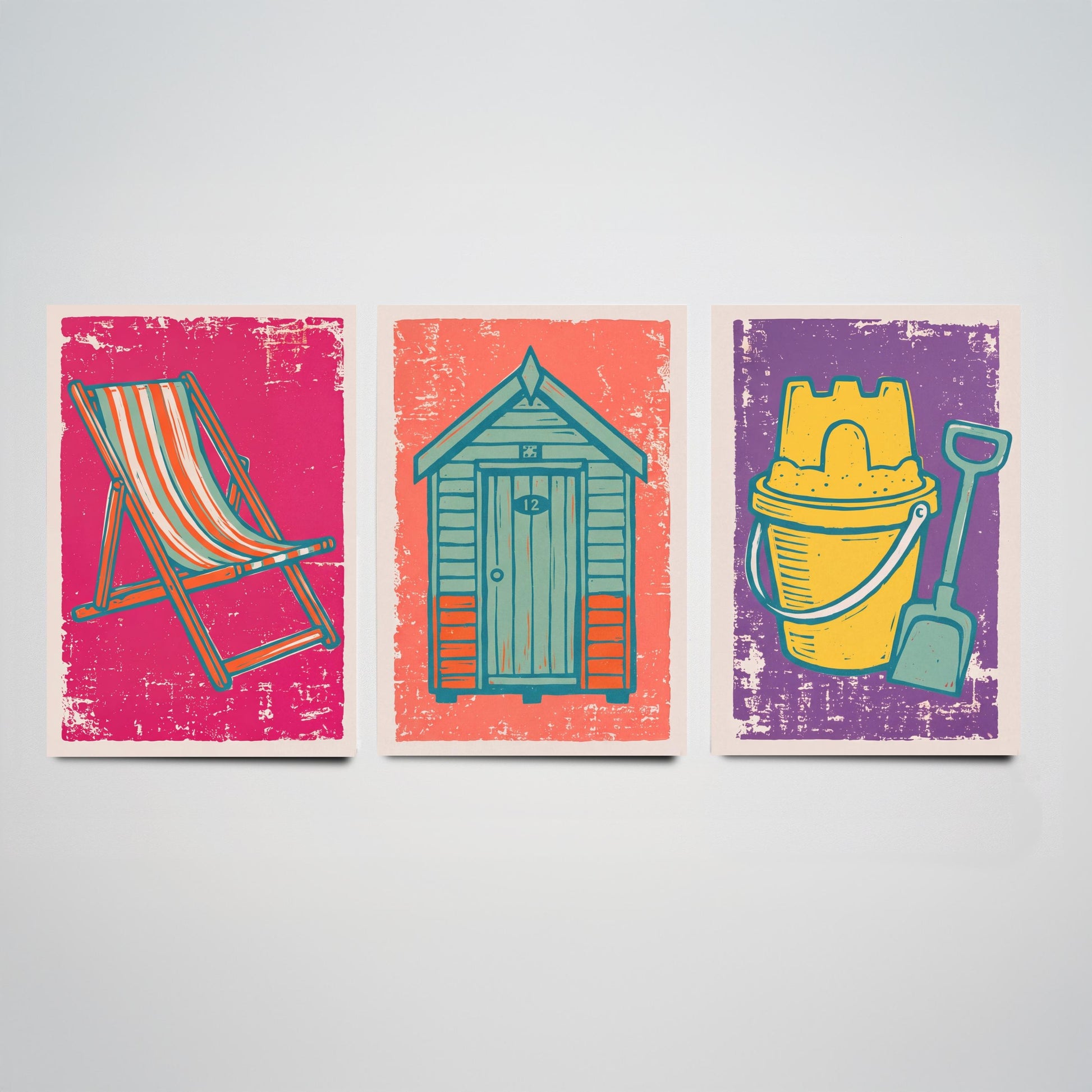 Set of Three British Seaside Art Prints - Deckchair, Beach Hut, Bucket and Spade - Linocut Illustrations - Coastal Triptych Posters V1