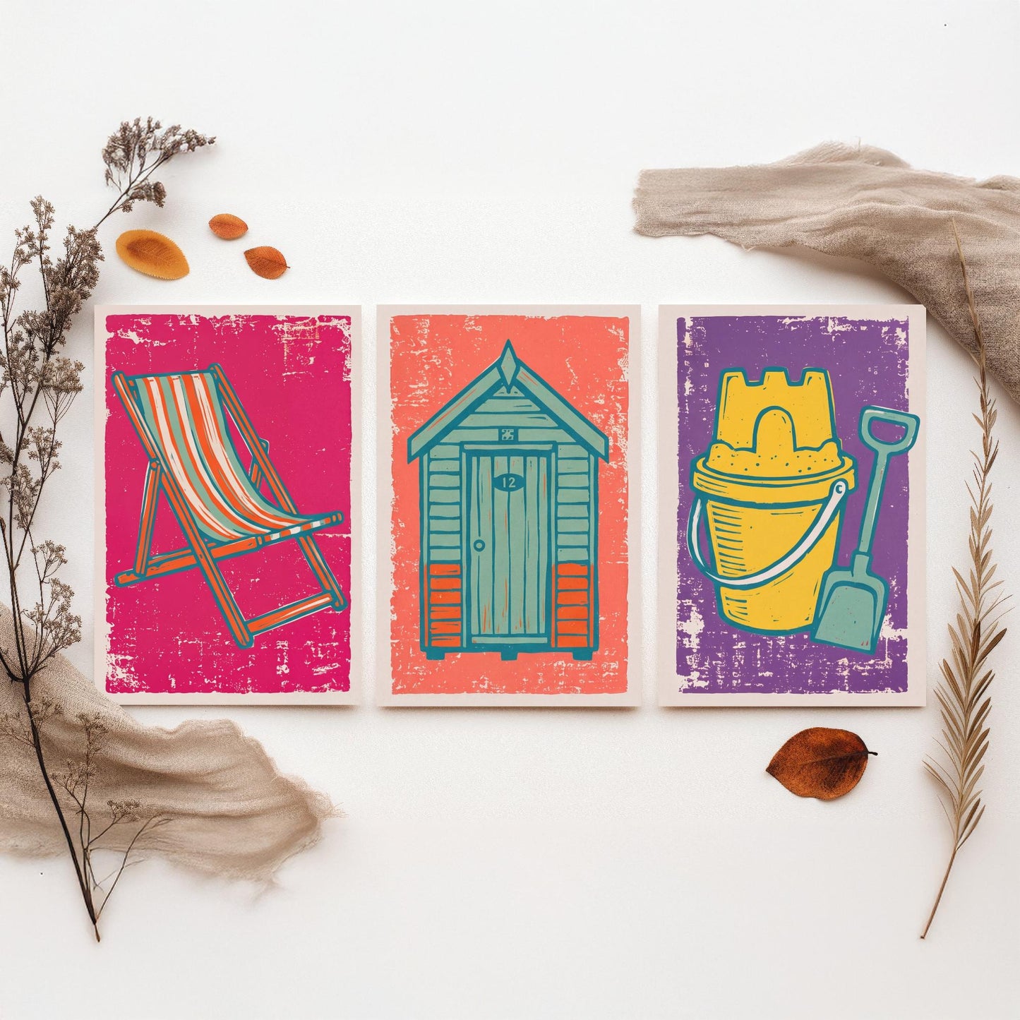 Set of Three British Seaside Art Prints - Deckchair, Beach Hut, Bucket and Spade - Linocut Illustrations - Coastal Triptych Posters V1